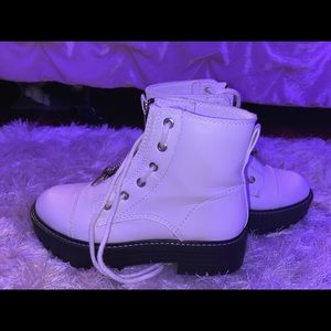 white and black chunky booties